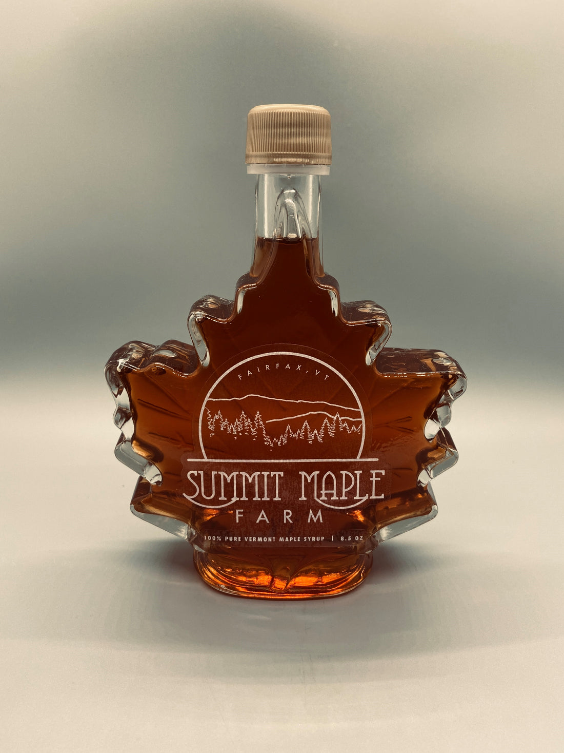 organic vermont maple syrup glass maple leaf bottle produced sustainably and made by a veteran owned small family farm